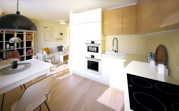 Kuchyňská linka následovala materiálovou paletu v obývacím pokoji, díky čemuž plynule zapadla do celkového interiérového konceptu. Napomohly tomu i plně zabudované spotřebiče.