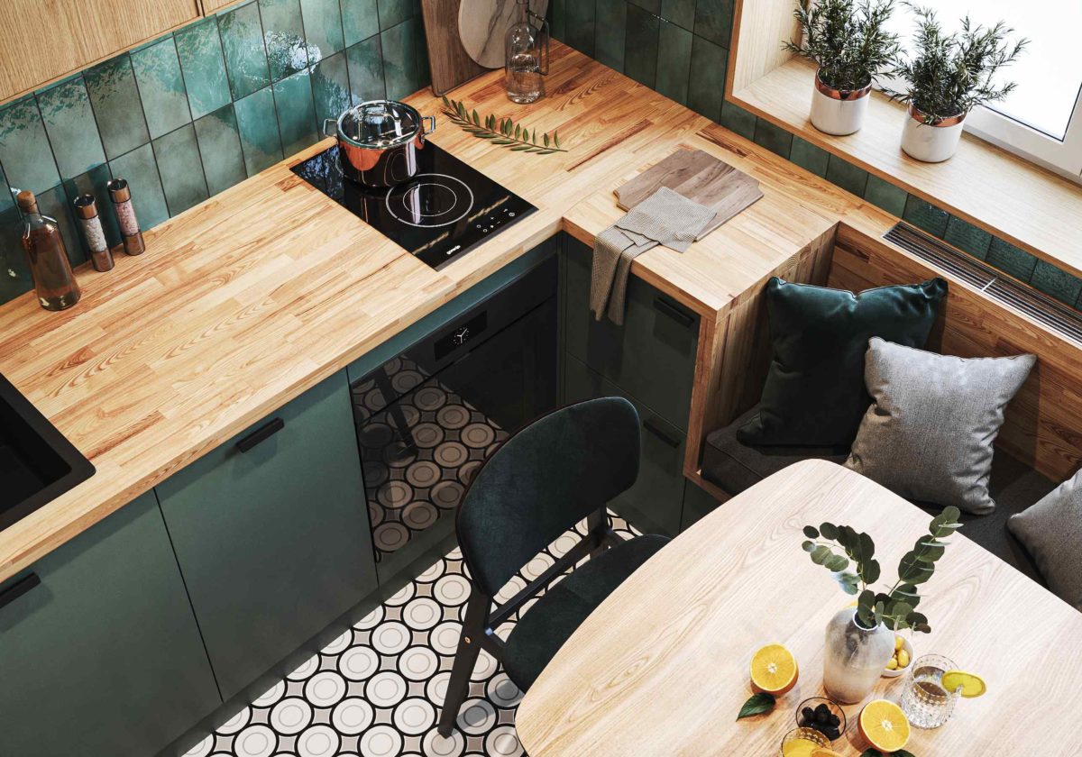 Smaragdovozelená kuchyň s geometrickou podlahou