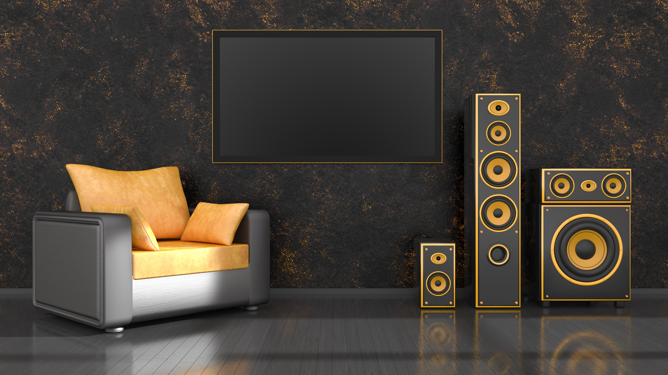 Black interior with modern design black and yellow speaker system and TV