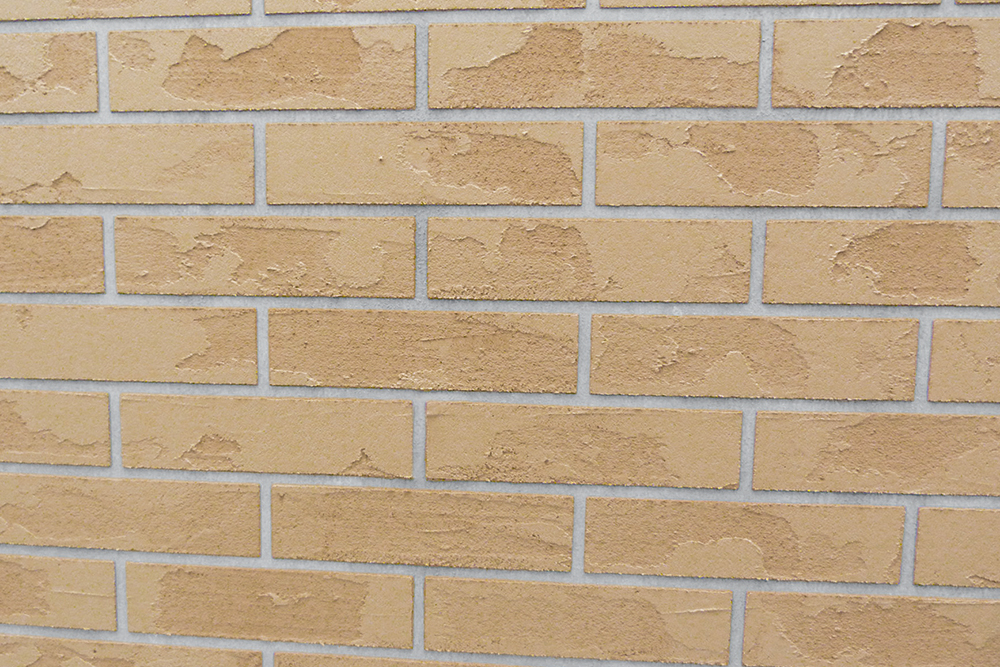 Detail efektu cihlové stěny v interiéru