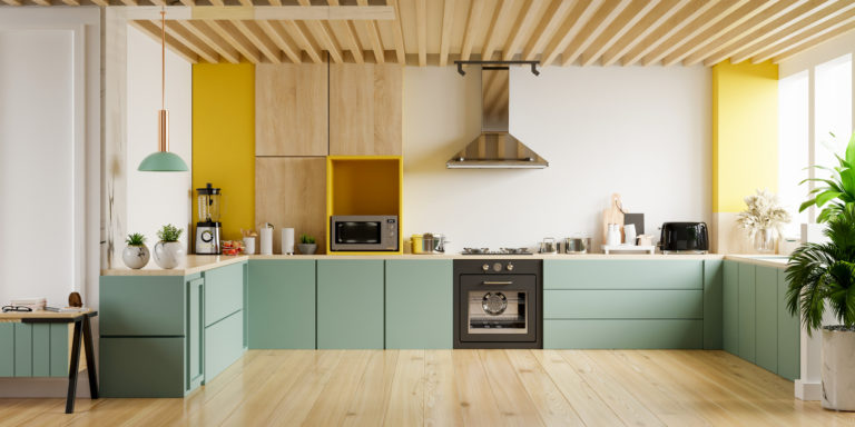 Moderní mátově žlutá kuchyňská linka bez horních skříněk