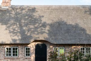 Cihlová fasáda - Nieby Crofters Cottage v Německu