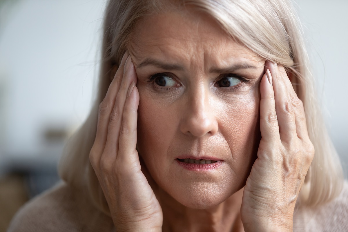 Close,Up,Of,Terrified,Mature,Woman,Look,In,Distance,Thinking