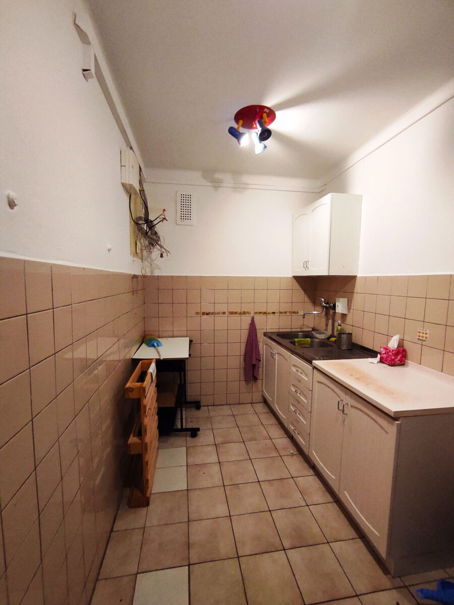 V prostorech současné koupelny byla kuchyňka.