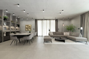 Prostorný obývací pokoj s jídelním koutem v neutrálních odstínech a s dostatkem denního světla.