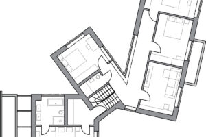 Půdorys horního patra rodinného domu s ložnicemi a koupelnou.