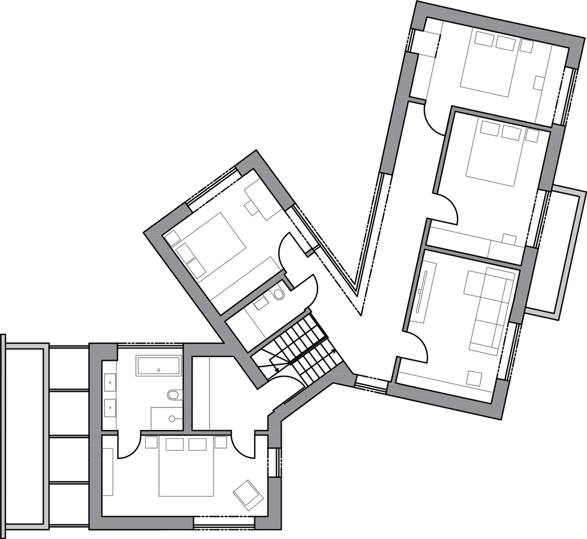 Půdorys horního patra rodinného domu s ložnicemi a koupelnou.