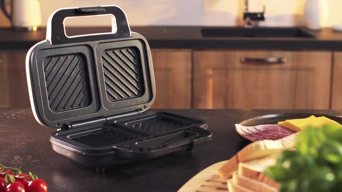 2× Sendvičovač GrandChef Speciálně tvarované zapékací desky s antiadhezním povlakem. Snadno a rychle v něm vyrobíte 2 kusy sendvičů, TESCOMA