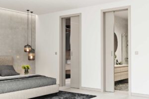 Stavební pouzdro NORMA UNIBOX – dvoje jednokřídlé dveře uzavírají dvě vedle sebe sousedící místnosti. Každé křídlo jezdí samostatně.