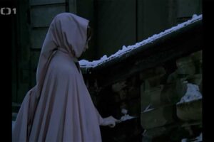 Popelka na schodišti zámku Moritzburg ve filmové scéně