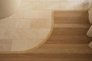 Detail koupelnového umyvadla a obkladu s jemnou strukturou a zaoblenými tvary