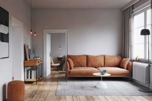 Obývací pokoj se sedačkou umístěnou mimo radiátor pro lepší cirkulaci tepla