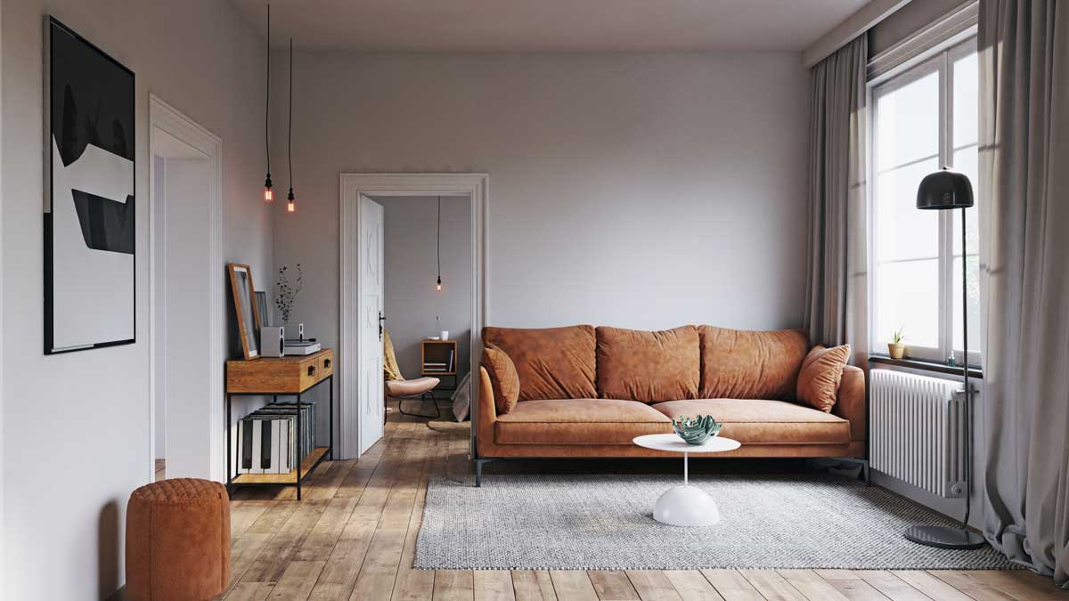 Obývací pokoj se sedačkou umístěnou mimo radiátor pro lepší cirkulaci tepla