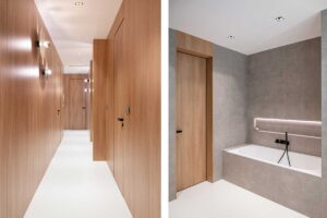 Dveře MASTER ve skryté zárubni a obkladu EFEKTA vytvářejí jednu rovinu. V koupelně je patrná souhra dřevodekoru a kamenných povrchů. Povšimněte si sjednocené podlahy.