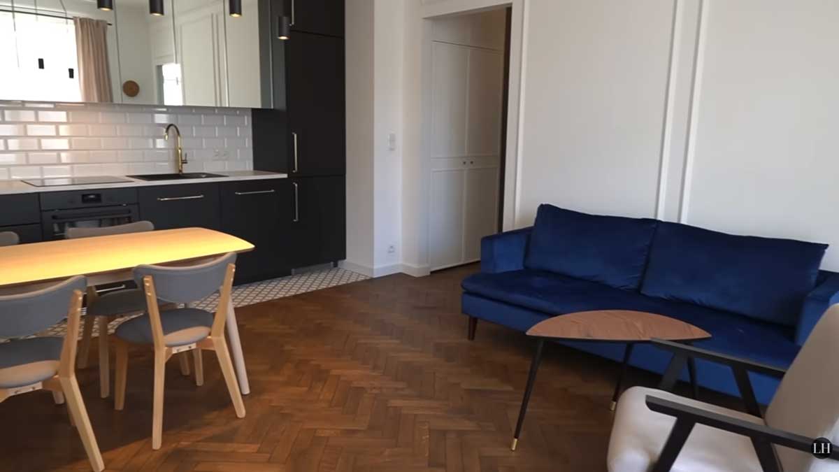 Otevřený obytný prostor po rekonstrukci propojuje obývací pokoj s kuchyní a jídelním koutem.