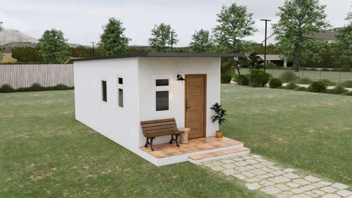 Tiny house v zahradě s plochou střechou a kompaktními proporcemi.