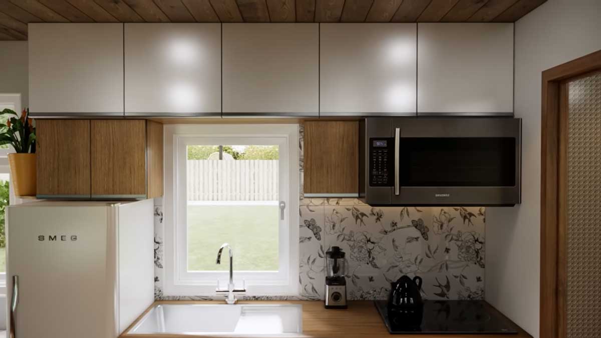 Detail kuchyňské linky s horními skříňkami a úložným prostorem až ke stropu.