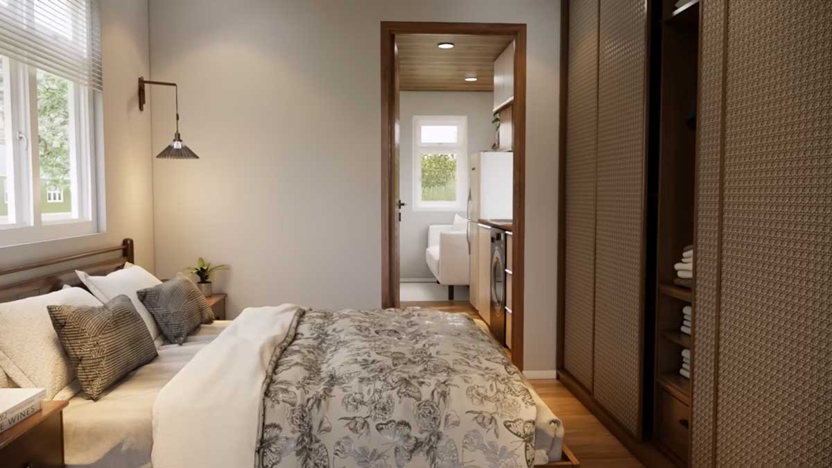 Ložnice v tiny house s velkou postelí a vestavěnou šatní skříní.