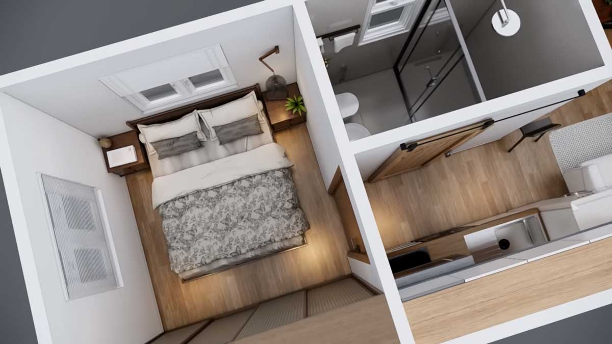 Pohled shora na ložnici v tiny house s efektivním využitím malého prostoru.