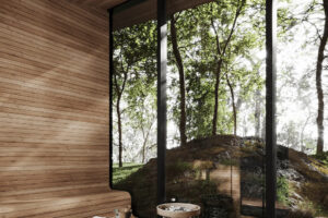 Dřevěná sauna s velkým oknem nabízí intimní wellness zážitek s výhledem na skalnatý lesní svah.
