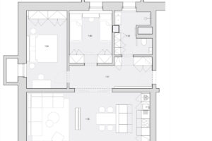 Půdorys apartmánu ukazuje upravenou dispozici s prostornější vstupní halou, dvěma ložnicemi a otevřenou obytnou částí.